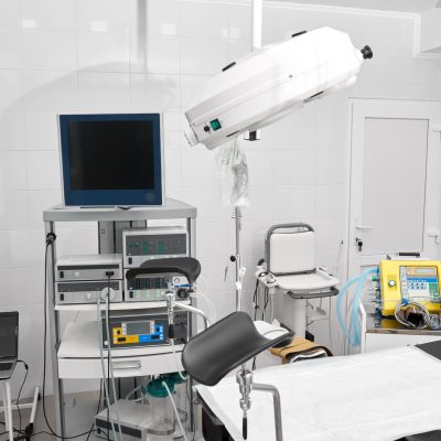 Shot of a gynecological room with chair for medical examinations and equipment medicine feminine health profession clinical hospital examine concept.